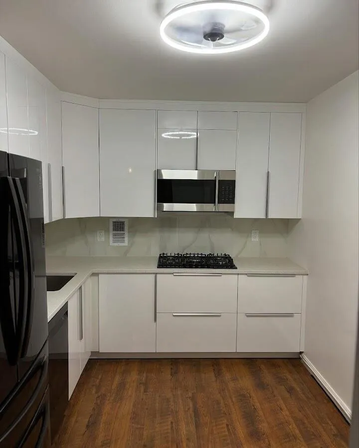 Renovated kitchen with quartz countertops in Geddes